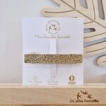 Barrette clip en feutrine pailletée basique doré de la marque Les Petites Hirondelles sur sa cartonnette