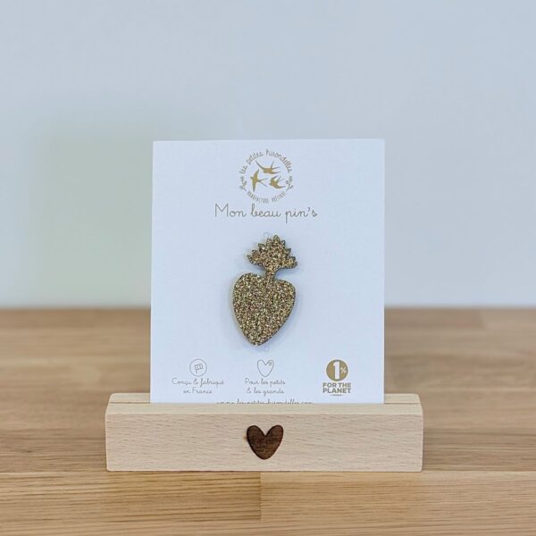 Pin's feutrine pailletée doré en forme de symbole sacré cœur