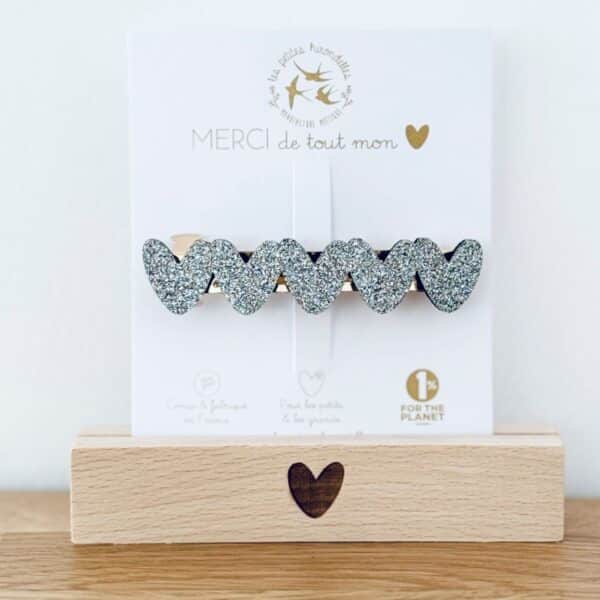Barrette clip coeur argenté en feutrine pailletée sur une cartonnette "merci de tout mon coeur"